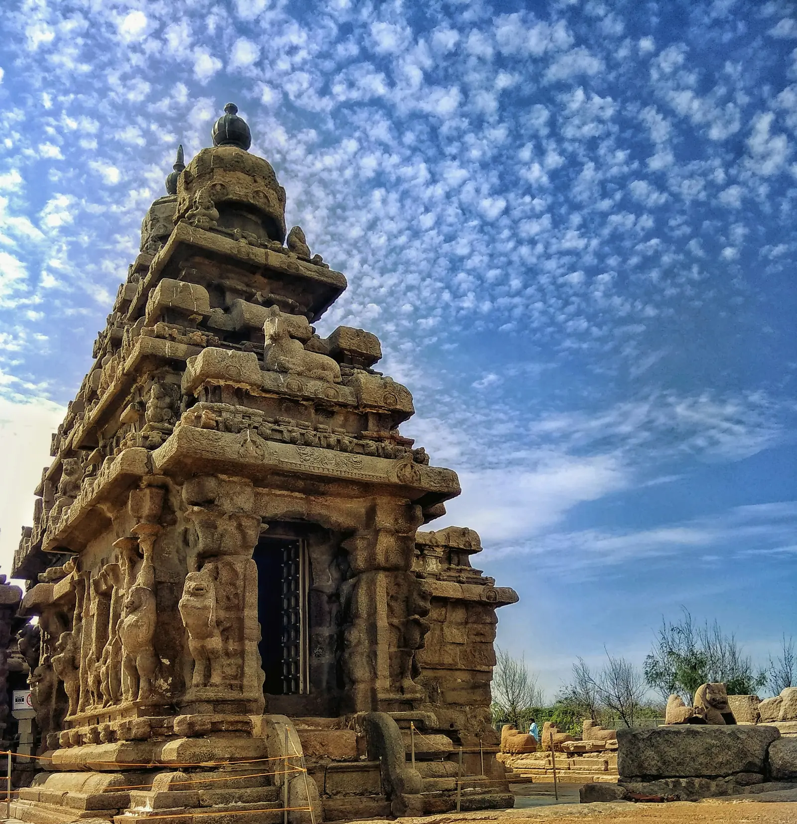 The Shore Temple at Mahabalipuram against a blue sky